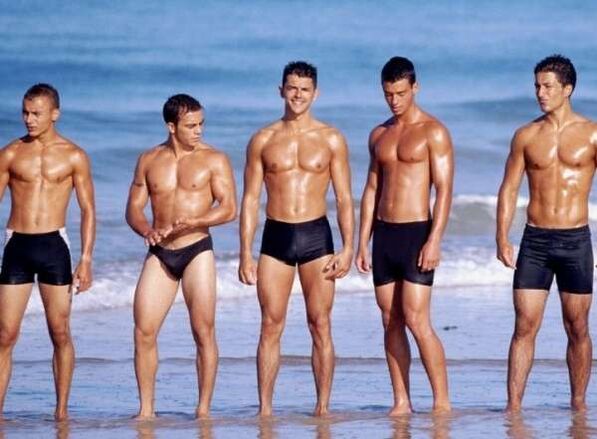 men on the beach with enlarged penises